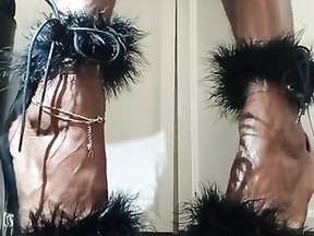 Oily Black Feet in Stilettos