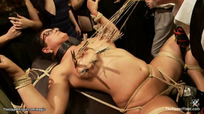 Busty slaves tight tied at party