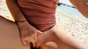 Beauty bald vagina touching outdoors on beach