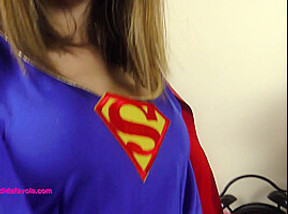 Sexy powered Daniela dressed in a Super Girl Costume with grey pantyhose