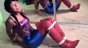 Dakota hogtied in red boots escapes from bonds