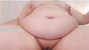 Humongous lady shows her fat belly and plays with pussy on webcam