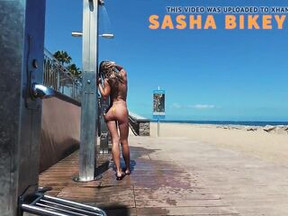 JOURNEY BARE - Public beach shower. Sasha Bikeyeva.Canaries