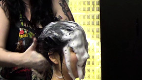 girl gets her hair washed