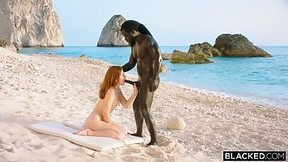 Red haired girl, Jia Lissa is sucking a big, black dick on the beach, before riding it