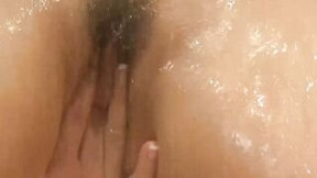 Cutie Ariella Ferrera is having a shower and masturbating