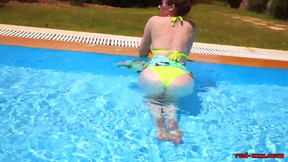 Sexy milf redhead masturbating in the pool