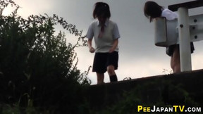 Weird asian teens peeing outdoors