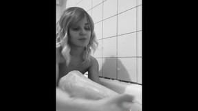 Shaving legs in the bathtub Natalia