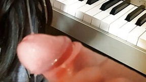 Blowjob on the piano - again interrupted by a hard cock.