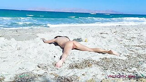 Horny wife in action with a dildo on the beach Victoria Kai